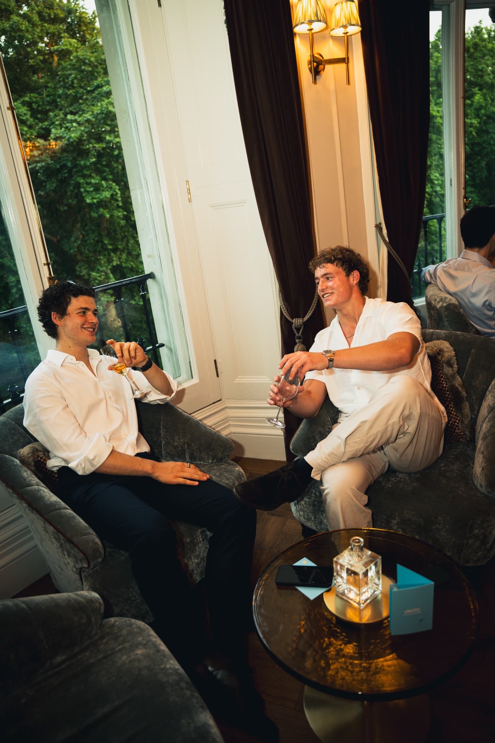 A group mid-conversation at a Clarity event