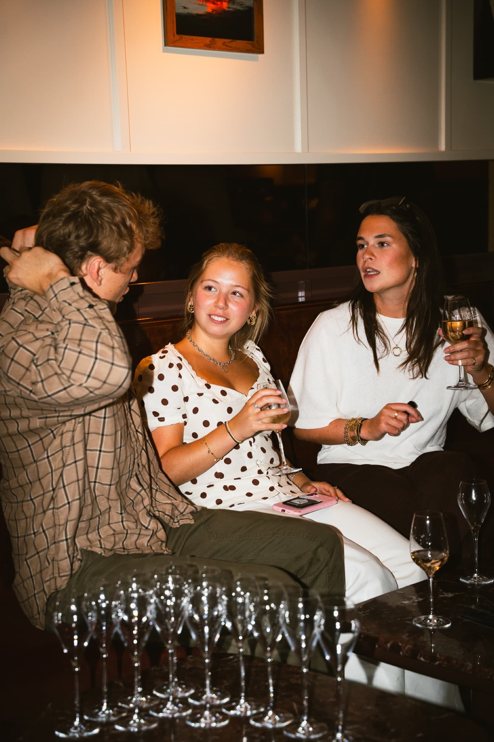 Guests laughing together at a Clarity event